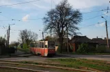 Jenakijeve sporvognslinje 4 med motorvogn 046 i krydset Tiunova Ulitsa/Lermontova Ulitsa (2011)