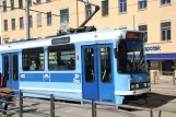 Oslo sporvognslinje 12 med ledvogn 111 ved Jernbanetorget (2013)