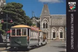 Postkort: Christchurch Tramway linje med bivogn 115 nær Canterbury Museum (2010)