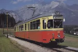Postkort: Innsbruck Stubaitalbahn (STB) med ledvogn 86 ved Muttereralmbahn (1986)