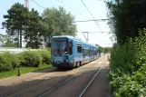 Rouen sporvognslinje M med lavgulvsledvogn 822 ved J.F. Kennedy (2010)