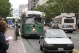 San Francisco F-Market & Wharves med motorvogn 1053 ved Market Street & Battery Street (2010)