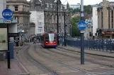 Sheffield sporvognslinje Blå med lavgulvsledvogn 116 på Commercial Road (2011)