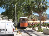 Sóller sporvognslinje med motorvogn 24 foran Strandcafe I Soller, Carrer de la Marina (2013)