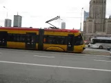 Warszawa sporvognslinje 15 med lavgulvsledvogn 3115 på Marszałkowska (2018)